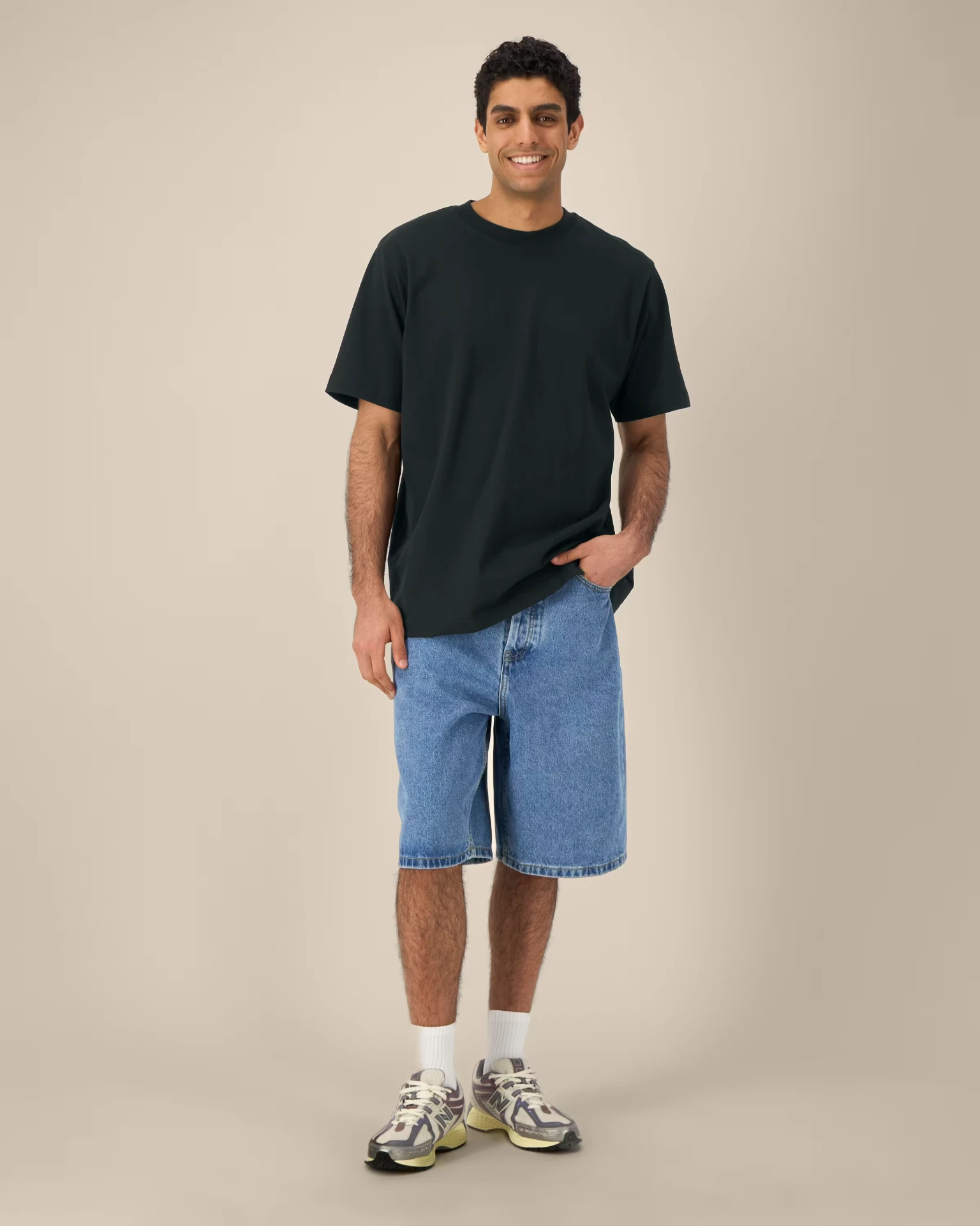 Custom branded heavy tee — black by REVEL