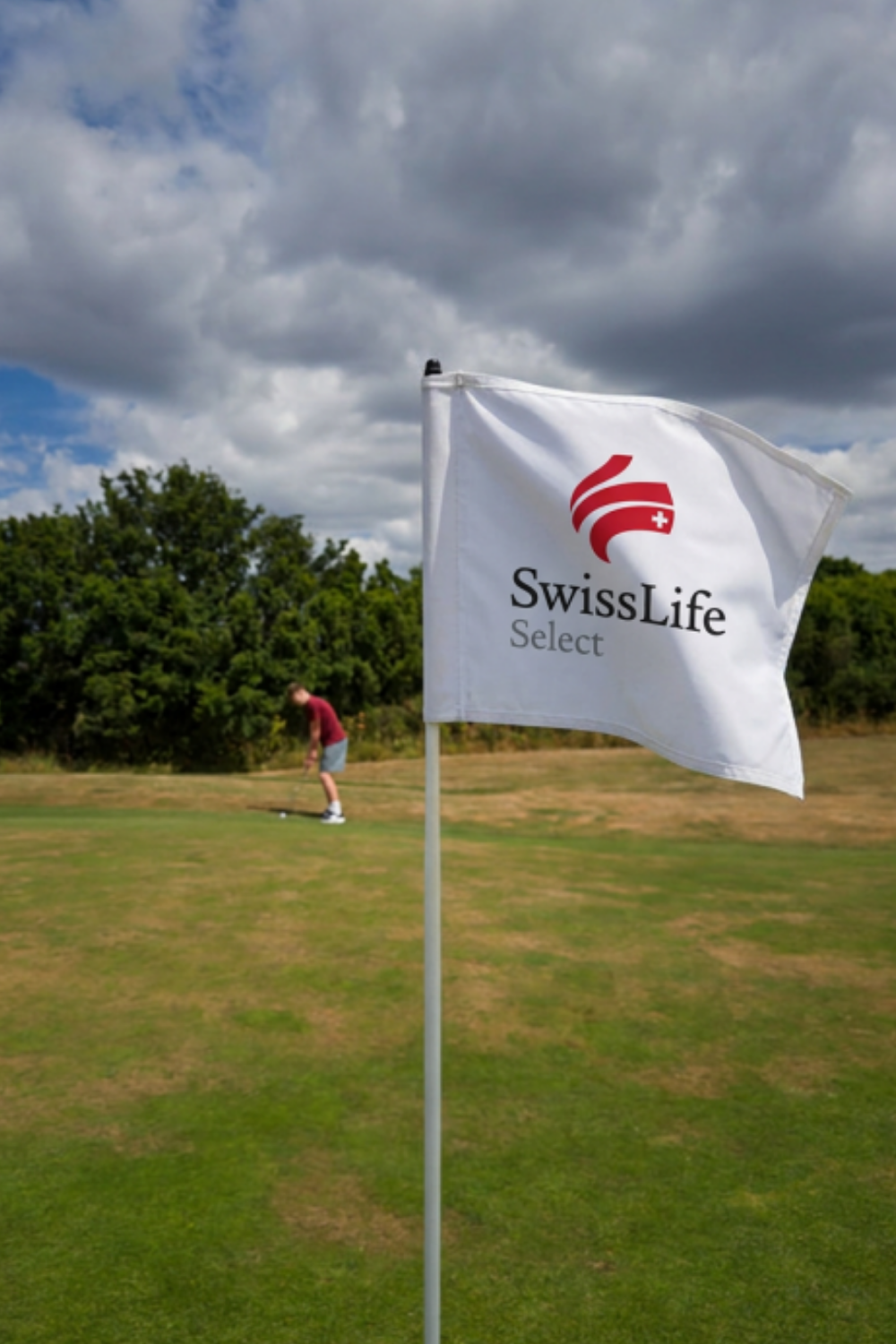 Custom branded putting green flag by REVEL