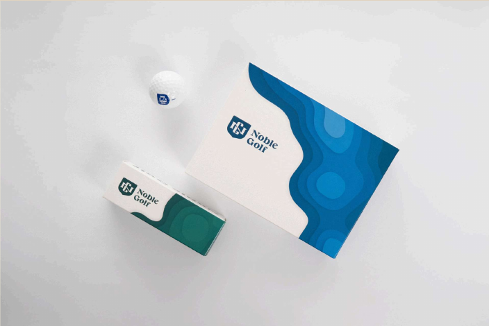 Custom golf ball box from the REVEL production archive.